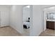 Bright hallway with bedrooms and a bathroom visible from the main area at 3709 Neblina Dr, Henderson, NV 89052
