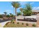 Welcome to Emerson by Lennar, featuring lush landscaping and a modern community entrance at 3709 Neblina Dr, Henderson, NV 89052