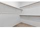 Walk-in closet with ample hanging space and a carpeted floor at 3709 Neblina Dr, Henderson, NV 89052