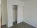 Carpeted room with a sliding door closet at 3965 Rebecca Raiter Ave # 201, Las Vegas, NV 89110