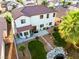 A two-story home with a landscaped backyard, patio, and a charming water feature at 4114 Jessica Marie St, North Las Vegas, NV 89032