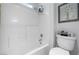 Bathroom showcasing white tile in the tub and shower that offer a clean and refreshing experience at 4114 Jessica Marie St, North Las Vegas, NV 89032