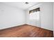 Bedroom features wood floors with natural light creating a calming atmosphere to unwind and relax at 4114 Jessica Marie St, North Las Vegas, NV 89032