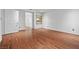 Bonus room featuring wood floors, white walls, and an open doorway at 4114 Jessica Marie St, North Las Vegas, NV 89032
