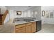 The kitchen features a granite countertop, stainless steel appliances, and a breakfast bar for casual dining at 4114 Jessica Marie St, North Las Vegas, NV 89032