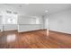 Spacious loft area with hardwood floors, neutral white walls, and plenty of natural light at 4114 Jessica Marie St, North Las Vegas, NV 89032