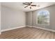 Bright bedroom featuring a large arched window offering ample natural light at 432 Emerald Heights St, Las Vegas, NV 89144