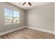 Bright bedroom featuring a large window with views and modern flooring at 432 Emerald Heights St, Las Vegas, NV 89144