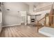 Spacious living room with high ceilings, fireplace, and wood-look flooring at 432 Emerald Heights St, Las Vegas, NV 89144