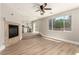 Inviting living room with natural light and backyard access, seamlessly connected to the kitchen at 432 Emerald Heights St, Las Vegas, NV 89144