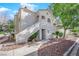 Charming condo featuring stucco exterior, red tile roof, and well-kept desert landscaping at 4324 W Lake Mead Blvd # 202, Las Vegas, NV 89108