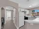 Well-lit kitchen with white cabinets, modern appliances, and open layout at 4324 W Lake Mead Blvd # 202, Las Vegas, NV 89108