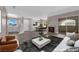 Open concept living area with a kitchen, dining area, fireplace, and comfortable seating at 4324 W Lake Mead Blvd # 202, Las Vegas, NV 89108
