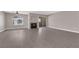 Living room features modern flooring, fireplace, ceiling fan, and large windows at 4324 W Lake Mead Blvd # 202, Las Vegas, NV 89108