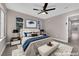 Inviting main bedroom featuring soft lighting, a ceiling fan, and minimalist design at 4324 W Lake Mead Blvd # 202, Las Vegas, NV 89108