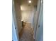 Well-lit bathroom featuring modern fixtures, a vanity, and walk in shower at 4675 Basilicata Ln # 103, North Las Vegas, NV 89084
