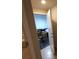 Bright bathroom featuring tile floors and a white door at 4675 Basilicata Ln # 103, North Las Vegas, NV 89084