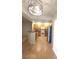 Updated kitchen featuring stainless steel appliances, tile floor, and ample cabinet space at 4675 Basilicata Ln # 103, North Las Vegas, NV 89084
