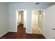 The main bedroom has entryways to both a spacious closet and a well-lit, modern bathroom at 4675 Basilicata Ln # 103, North Las Vegas, NV 89084