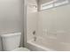 Bright and airy bathroom features a tiled shower and tub at 4705 Delicate Arch Ct, North Las Vegas, NV 89031