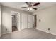 Bedroom boasts closet, neutral carpet and an ensuite bathroom at 4705 Delicate Arch Ct, North Las Vegas, NV 89031