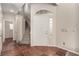 Bright foyer with tile flooring and staircase to the upper level, creating a welcoming entrance at 4705 Delicate Arch Ct, North Las Vegas, NV 89031