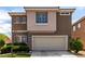 Charming two-story home boasts a two-car garage and lush landscaping in a desirable neighborhood at 4705 Delicate Arch Ct, North Las Vegas, NV 89031