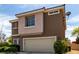 Lovely two-story home showcases a two-car garage and low-maintenance landscaping in a friendly area at 4705 Delicate Arch Ct, North Las Vegas, NV 89031