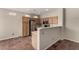 Functional kitchen features oak cabinets, stainless steel appliances, and tiled flooring at 4705 Delicate Arch Ct, North Las Vegas, NV 89031