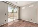 The room provides access to the patio with terracotta flooring and a bright, airy feel at 4705 Delicate Arch Ct, North Las Vegas, NV 89031