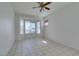 Bright living room with large windows offering natural light and neighborhood views at 494 Dart Brook Pl, Henderson, NV 89012