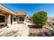 Covered patio with a view of the backyard landscaping at 494 Dart Brook Pl, Henderson, NV 89012