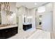 Luxurious bathroom with dual vanities, soaking tub, and designer finishes at 5 Crystal Tree Pass, Henderson, NV 89052