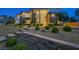 Beautifully landscaped front yard with stone accents and manicured bushes at 5 Crystal Tree Pass, Henderson, NV 89052