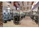 A fitness center featuring modern exercise equipment and a spacious layout, with exposed beam ceilings at 5 Crystal Tree Pass, Henderson, NV 89052