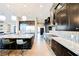 Bright kitchen with a large island, stainless steel appliances, and open floor plan at 5 Crystal Tree Pass, Henderson, NV 89052