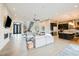 Spacious open-concept layout with living room, staircase, and kitchen featuring elegant finishes at 5 Crystal Tree Pass, Henderson, NV 89052