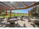 Inviting outdoor patio with comfortable seating and views of the community golf course at 5 Crystal Tree Pass, Henderson, NV 89052