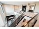 Upper landing staircase offers spacious layout with an open staircase with sleek steel railings at 5 Crystal Tree Pass, Henderson, NV 89052