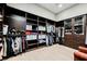 Spacious walk-in closet with custom shelving and ample storage for clothes and accessories at 5 Crystal Tree Pass, Henderson, NV 89052