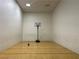 Indoor basketball court featuring hardwood floors and a portable basketball hoop for recreational activities at 5170 S Jones Blvd # 108, Las Vegas, NV 89118