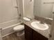Bathroom with granite countertop, updated fixtures, and shower-tub combination at 5170 S Jones Blvd # 108, Las Vegas, NV 89118
