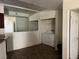 Laundry area featuring a mirrored wall, washer, and dryer at 5170 S Jones Blvd # 108, Las Vegas, NV 89118