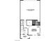 First-floor plan showcasing primary bedroom, garage, laundry, foyer, and covered porch layout at 5761 Crenellated St # Lot 60, Las Vegas, NV 89148