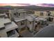 An aerial view reveals the modern design and layout of this home and its beautiful desert community at 577 Overlook Rim Dr, Henderson, NV 89012