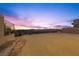 Large backyard with potential for landscaping and outdoor living, offering stunning city views at 577 Overlook Rim Dr, Henderson, NV 89012
