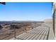 Expansive balcony with scenic views, modern railings, and sleek design elements at 577 Overlook Rim Dr, Henderson, NV 89012