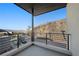 Private balcony overlooking desert landscape with mountain views and clear sky at 577 Overlook Rim Dr, Henderson, NV 89012