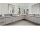 Elegant bathroom with dual vanities, modern fixtures, and stunning granite countertops at 577 Overlook Rim Dr, Henderson, NV 89012
