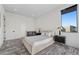 Modern bedroom with a platform bed, sleek furnishings, and a bright, airy ambiance at 577 Overlook Rim Dr, Henderson, NV 89012